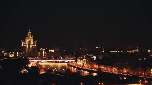 Moscow State University tower scenic timelapse scenic view of night Moscow. Colorful city lights, road and river traffic
