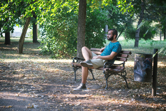 Portrait of a male model on the banch