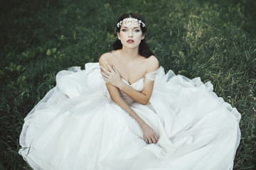 Portrait of a beautiful bride in a romantic wedding dress