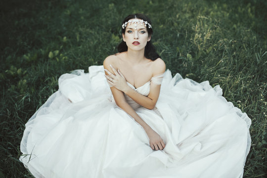 Portrait of a beautiful bride in a romantic wedding dress