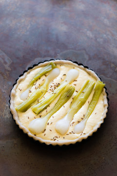 raw quiche with ricotta and green onions