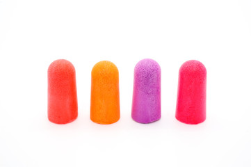 close-up ear plugs stoppers for protection against noise , isolated on a white background