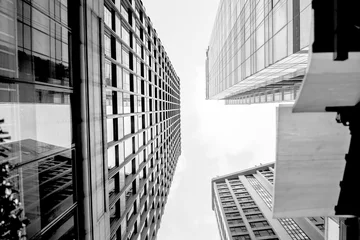 Papier Peint photo autocollant construction de la ville Glass surface view in district business centers with black and white color