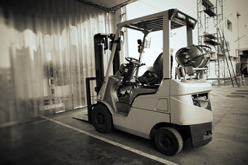 Black forklift truck shot