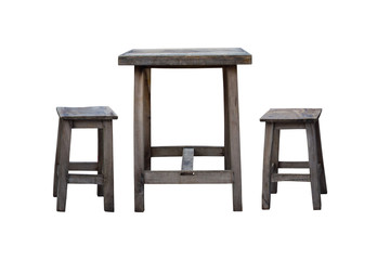 Old wooden table and old wooden chairs isolated on white background.