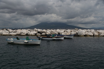 Three boats in harbor