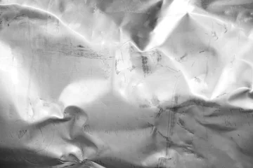 Rolgordijnen crumpled and scratched metal texture © Saichol