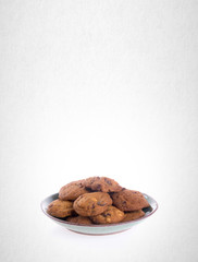 Cookies or Chocolate chips cookies on background.