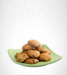 Cookies or Chocolate chips cookies on background.