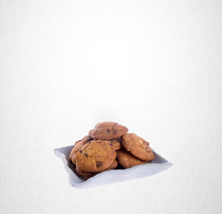 Cookies or Chocolate chips cookies on background.