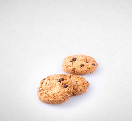 Cookies or Chocolate chips cookies on background.