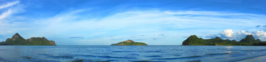 Panoramic view of tropical paradise sea and mountain range with beautiful blue sky at Manao bay , Prachuap Khiri Khan , Thailand.