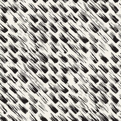 Vector seamless pattern with brush stripes and strokes. Black and white background with ink elements. Hand painted grunge texture.