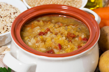 healthy lunch, soup with lentils and vegetables, closeup