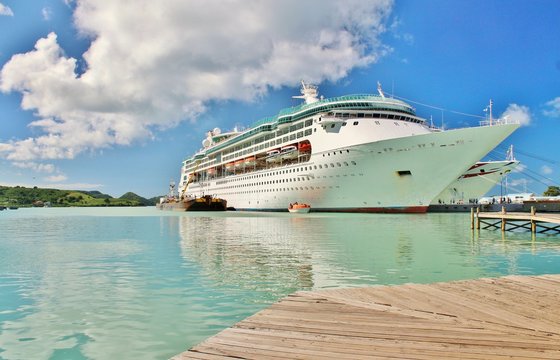 A cruise ship docked  on the tropical island of St. Johns, Antigua