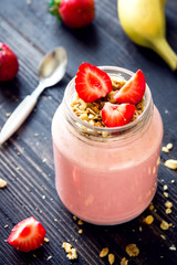 Strawberry smoothie with granola