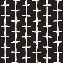 Seamless pattern with hand drawn lines. Abstract background with freehand brush strokes. Black and white texture. Ornament for wrapping paper.
