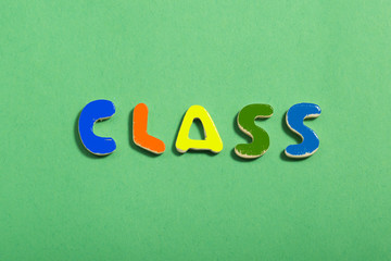 Word in Multiple Colors on Green Background CLASS
