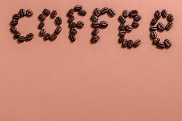 Word Coffee written in coffee beans