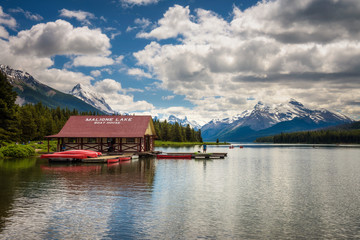 Boat house and canoes on a jetty at Maligne Lake in Jasper National Park, Canada