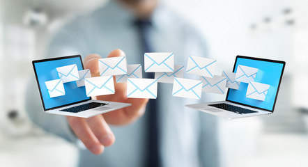 Businessman receiving e-mails on his digital devices 3D rendering