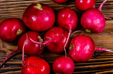 Radish on wooden table. Top view