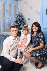 Mom dad and daughter in the new year.