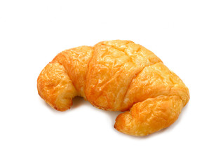 Fresh and tasty croissant over white background
