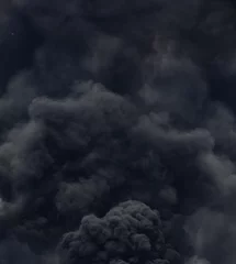 Foto op Plexiglas zwarte rook van een vuur © Baranov