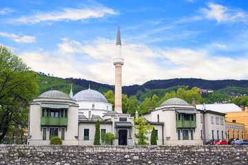 Beautiful view of the Emperor's Mosque in Sarajevo on the banks of the Milyacka River, Bosnia and...