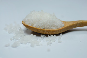salt on wooden spoon