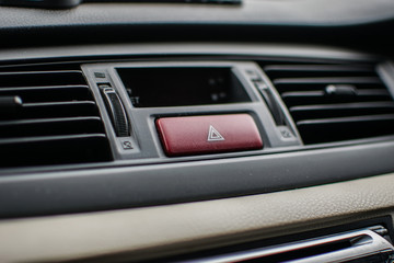 Obraz na płótnie Canvas Emergency light button in car