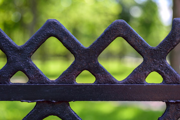 Fragment of a metal fence