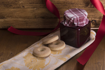 homemade jam with wild berries, served with biscuits