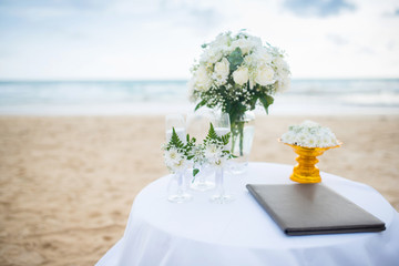 Soft focus Flowers decorate at a wedding ceremony on the beach.