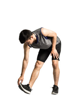 Portrait Of An Asian Sport Man Stretching His Bodies Before Exercise. Isolated Full Length On White Background With Copy Space And Clipping Path