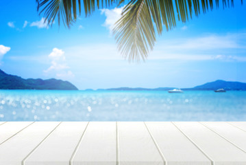 white wooden table and beautiful sea in summer.