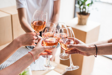 women clinking with wineglasses