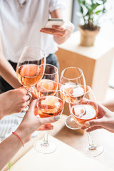 women clinking with wineglasses