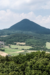 Fototapeta na wymiar Milesovka from Ostry hill in Ceske stredohori mountains in Czech republic