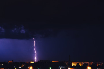 Beautiful lightning above the night city