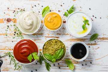Selection of different sauces in bowls