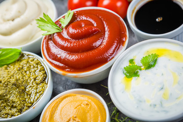 Selection of different sauces in bowls