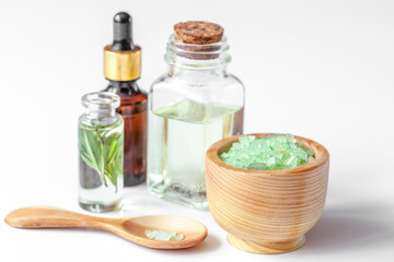 organic cosmetics with extracts of herbs rosemary on white backg