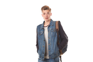 Fototapeta premium Portrait of schoolboy expressing emotions against white background