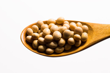 soy beans  on wood spoon