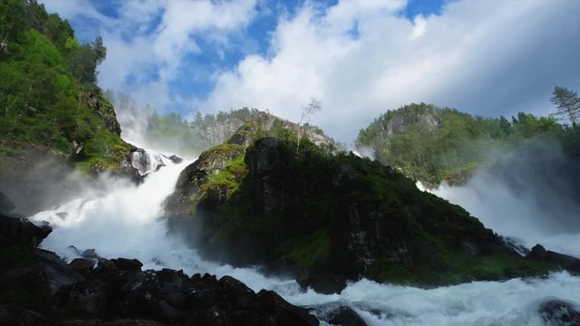 Dramatic footage of Latefossen Waterfall Odda Norway. Latefoss is a famous twin waterfall.