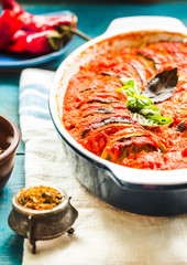 Ratatouille - traditional French Provencal vegetable dish cooked in oven. Autumn food concept.