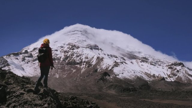 Woman in expedition on the andean mountains