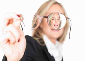 Portrait of a woman trough glasses